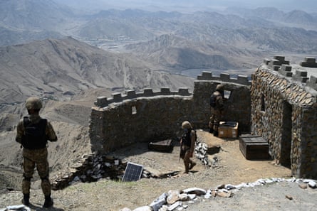 Pakistani troops patrol along the border with Afghanistan