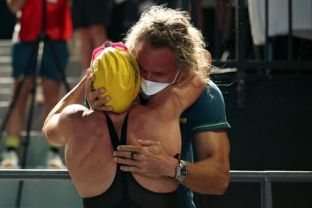 Pallister hugs her coach Dean Boxall.