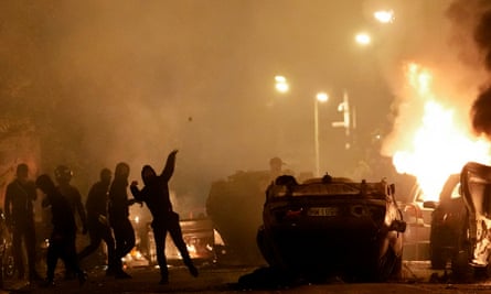 Youths clash with police forces in Nanterre, outside Paris, after the death of Nahel