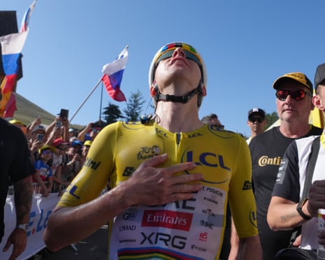 Slovenia's Tadej Pogacar looks to the sky after his incredible stage win on Alpe d’Huez