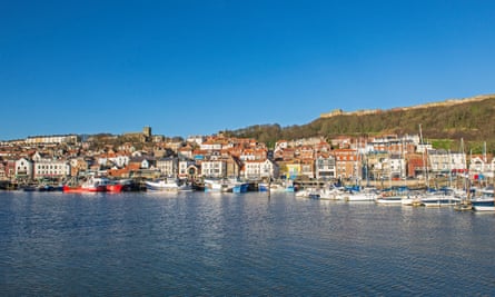 Harbor seafront town with castle on hill: Scarborough
