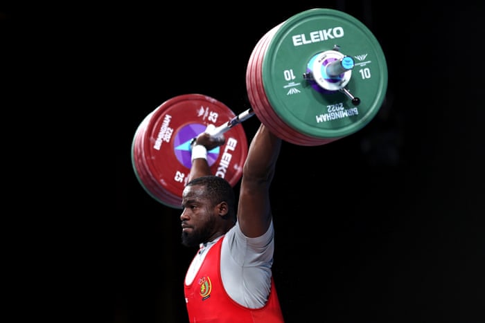Junior Periclex Ngadja Nyabeyeu of Cameroon performs a snatch during the men’s weightlifting 109kg Final.