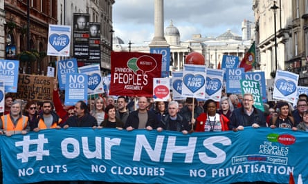 Demonstrators attend a rally in central London, in support of the NHS in 2017.