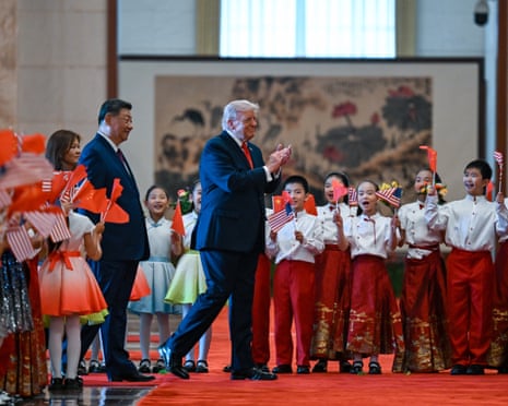 Trump accompanied by Xi during the welcome in the Great Hall of the People in Beijing on Thursday
