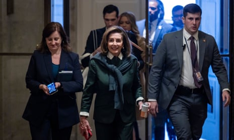 Former Speaker of the House Nancy Pelosi, in dark green dress, prepares to speak about House Republican Leader Kevin McCarthy's bid to be the next speaker in the US Capitol in Washington, DC, USA.