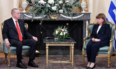 Greece’s President Katerina Sakellaropoulou, right, speaks with her Turkish counterpart Recep Tayyip Erdogan during their meeting at the Presidential Palace in Athens, Greece, Thursday, Dec. 7, 2023. Erdogan arrived in Greece on a visit designed to set the historically uneasy neighbors on a more constructive path and help repair strained his country’s strained relationship with the European Union.