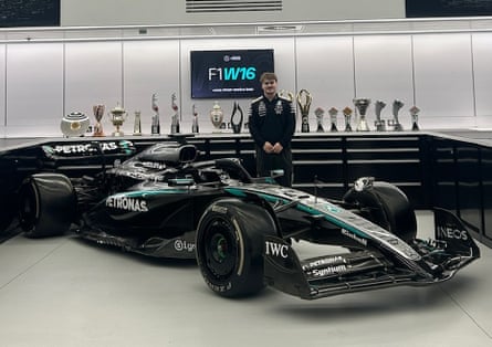 Kian Brown stands next to a Mercedes F1 car at Silverstone UTC