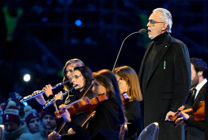Winter Olympics 2026 opening ceremony review – disco-dancing opera masters upstage Mariah Carey | Music | The Guardian