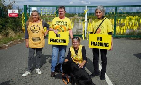 Fracking protesters, from left, Tina Rothery, Tracey Booker, Julie Daniels with dog Lizzie, and Pauline Jones at the Preston New Road fracking site near Blackpool.