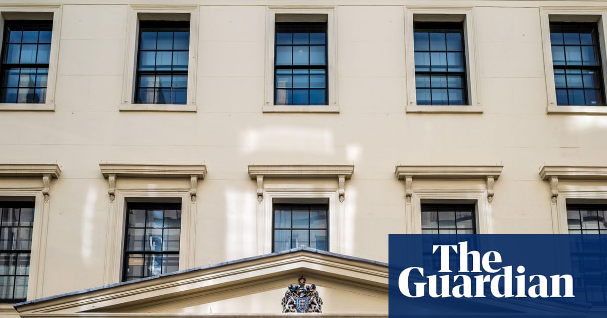 Met investigates racist graffiti found in staff area at its own police station