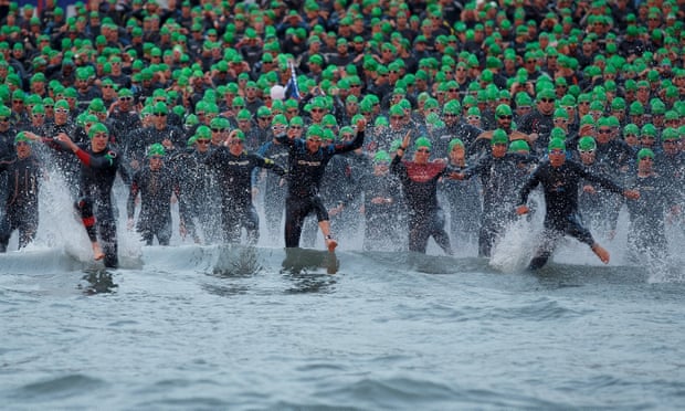 Athletes compete during the swim section