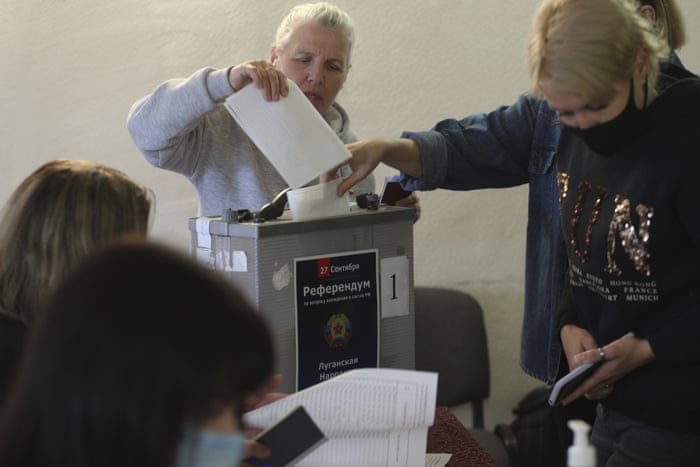 People from the occupied Luhansk region voting in Russia.