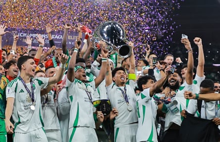 Roberto Firmino of Al Ahli (Saudi Arabia) lifts the 2025 Asian Champions League trophy after the final against Kawasaki Frontale (Japan)