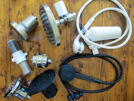 A set of shower filters arranged on a floor