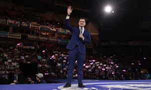 Pete Buttigieg waves to the crowd in Manchester, New Hampshire, on 8 February.