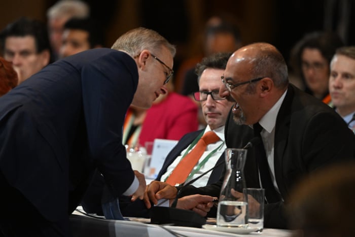 Peter Khalil (right) speaks with Anthony Albanese during the jobs and skills summit earlier this month.