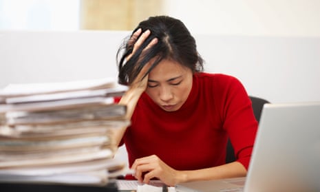 stressed woman at desk