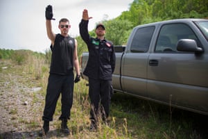 KKK members salute next to a pickup truck at a private campground in Whitesburg, Kentucky.