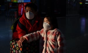 Schools across Shanghai are to remain shut until the end of February. Here’s a photo by AP of a child wearing a protective face mask at the usually full Hongqioa train station in Shanghai. Some reports suggest the city is unusually quiet for this time of year, with businesses closing their doors and residents choosing to remain inside.