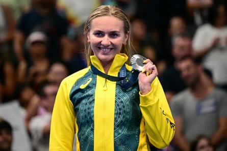 Australian swimmer Ariarne Titmus poses with her medal on the podium of the womenâÂÂs 200m freestyle swimming at the 2024 Olympics