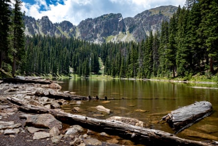 Trampas Lakes in New Mexico’s Pecos wilderness: a clear lake surrounded by tall pine trees.