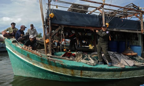 Vietnamese fishermen on their seized boat after they were detained at sea by the Thai Royal Marine Police in Thailand’s province of Narathiwat on 14 February 14 2016.