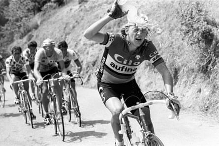 Laurent Fignon squirts water on his head as he cycles