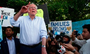 Bernie Sanders stands looks into a detention center for migrant children in Homestead, Florida, on 26 June 2019. The Trump administration announced Monday it would close the facility.