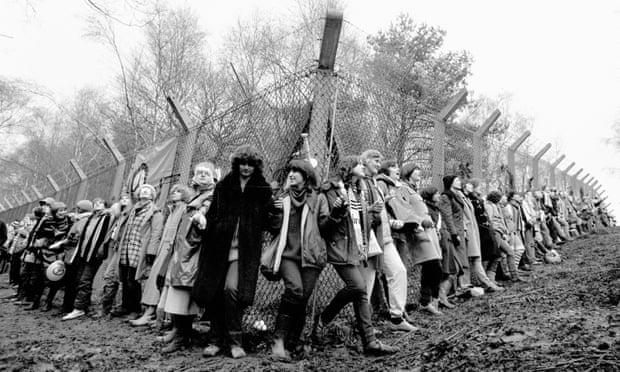 Peace activists chain themselves to a fence surrounding RAF Greenham Common in 1981.