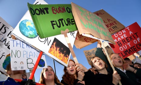 Children taking part in a climate change protest in London