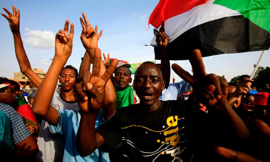 Sudanese protesters at a rally in Khartoum mourning deaths of dozens of demonstrators