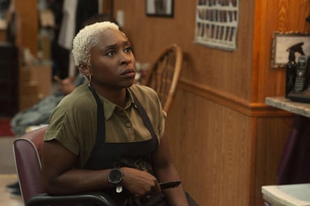 Cynthia Erivo with short bleached blond hair and wearing dungarees