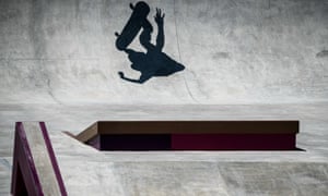 The shadow of a skateboarder during practise.