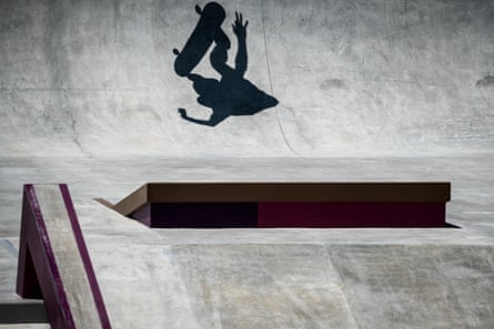 The shadow of a skateboarder is seen during a practice session at Ariake Urban Sports Park in Tokyo.