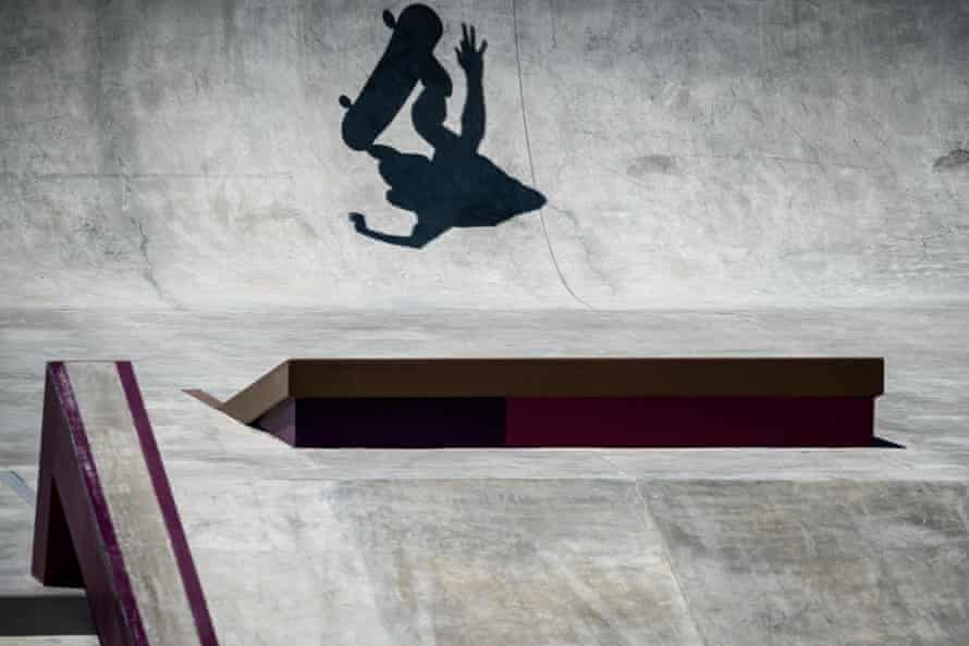 The shadow of a skater is seen during a practice session at Ariake Urban Sports Park in Tokyo.