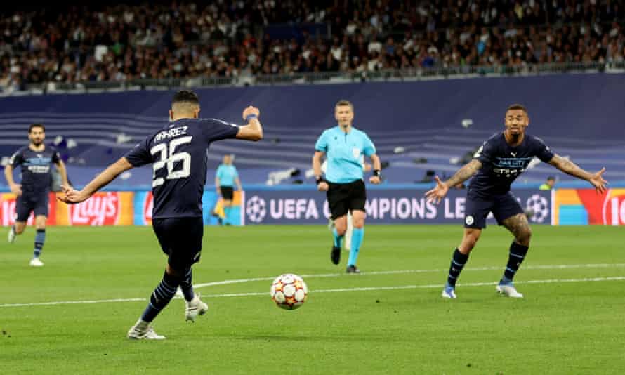 Riyad Mahrez shoots to put Manchester City into the lead on the night