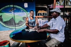 Dominoes is often played by locals on the street after a long working day.