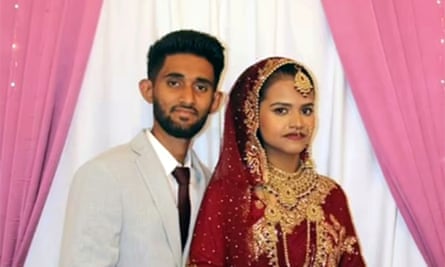 Habibur Masum and Kulsuma Akter pose for a wedding photo