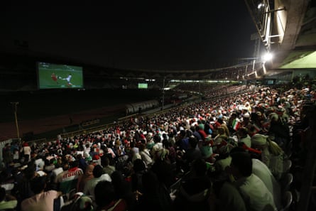 Iranians at Azadi stadium in Tehran watch the 2018 World Cup group game between Portugal and Iran.