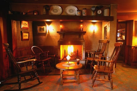 Fireside with table and chairs. Bushmills hotel, County Antrim