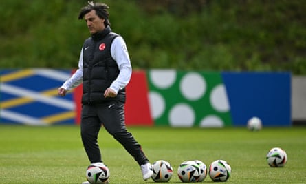 Turkey's Italian head coach, Vincenzo Montella, supervises a training session before their opening game against Georgia.