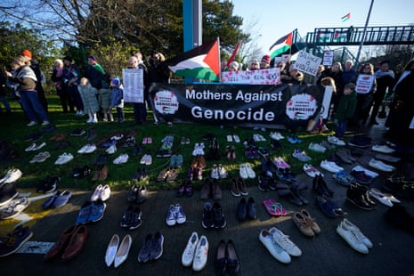 108 pairs of shoes for each journalist killed in Gaza are laid out as Mother’s Against Genocide protest against RTE’s reporting of the Israel-Gaza conflict outside RTE television centre in Dublin on January 6, 2024.