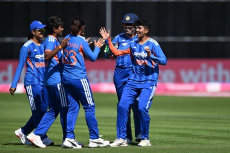 Sree Charani of India celebrates taking the wicket of Amy Jones of England.