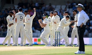 England celebrate the successfully review of the wicket of Cheteshwar Pujara of India.