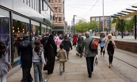 multi cultural and multi ethnic shoppers in Manchester city centre