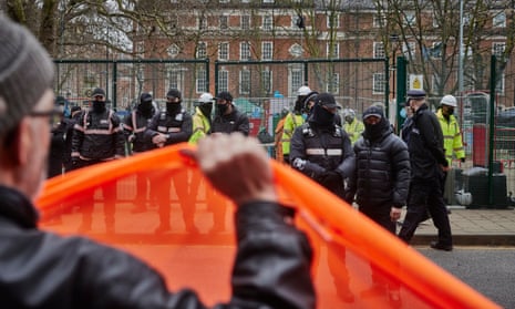 HS2 protesters in February face-off with bailiffs, security, HS2 workers and police at the entrance to the HS2 compound outside Euston station in London.