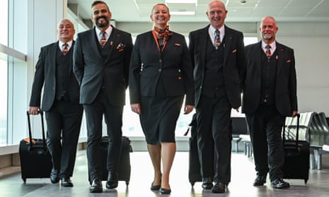 From left: Mike Tear, 58, Carlos Santa Monica, 48, Hazel West, 48, Peter Wanless, 68, and Gary Fellowes, 63 smiling in easyJet uniforms