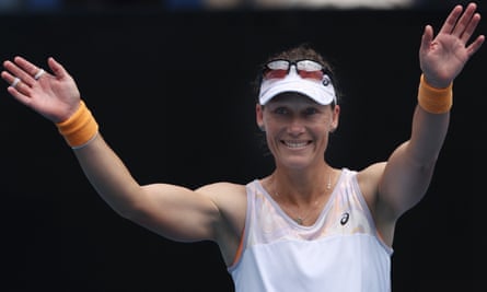 Sam Stosur waves farewell to spectators after her loss in the women’s doubles.