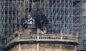 The damaged roof of Notre Dame after the fire