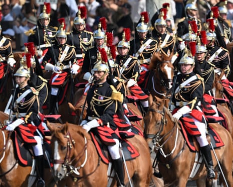 Members of the French Republican Guardâs cavalry regiment take part in the traditional military parade on the Champs-Elysees Avenue during celebrations marking France’s National Day, also known as Bastille Day, in Paris, France.